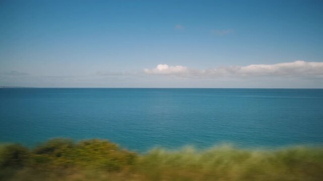 Cinematic View of Deep Blue Ocean Horizon from Moving Vehicle, Summer Vacation Travel Background in Full HD