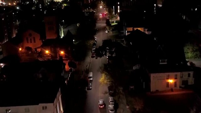 Scranton at Night Pennsylvania Drone View of Downtown Illuminated City Lights and Urban Buildings Creating a Dynamic Metropolitan Panorama with Bright Evening Streets