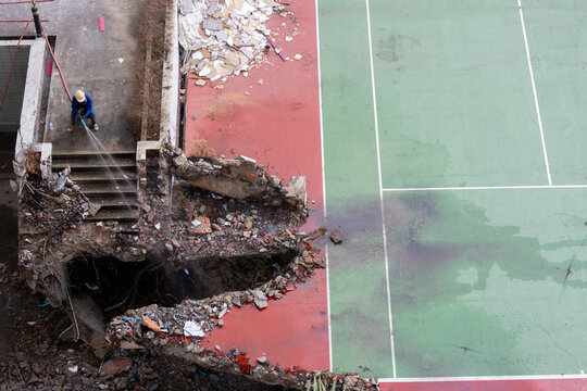Building Demolition and Water Spraying Work