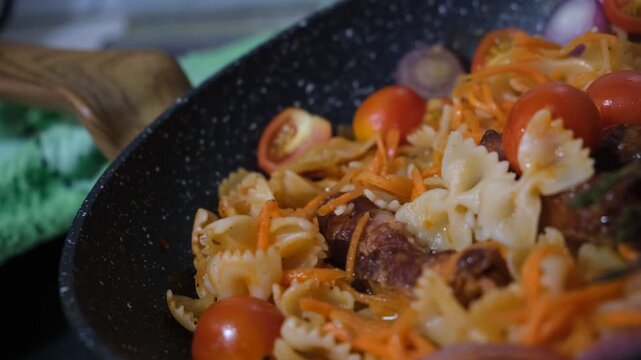 Farfalle pasta with chicken necks cooked in a skillet &mdash; a bold and unusual recipe that turns a humble ingredient into a star dish. Tender farfalle is tossed with crispy pan‑fried chicken necks, aromat