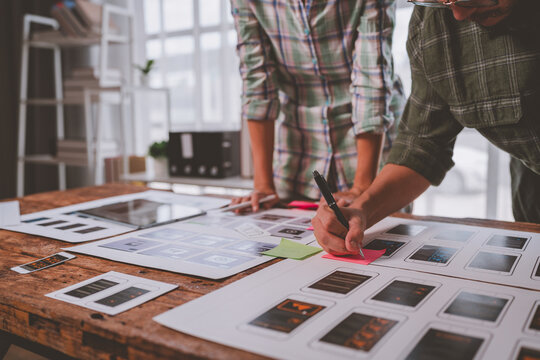 Team collaborating on ux ui design and mobile application prototyping