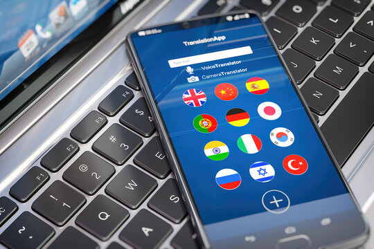 Foreign languages translation or learning languages online. Mobile phone or smartphone with dictionary app on the screen.