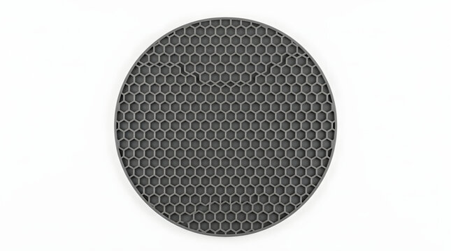 Circular metal mesh grill with a hexagonal honeycomb pattern isolated on a white background