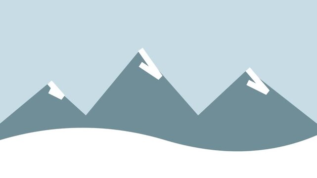 Snow capped mountain range over white snowy hills and pale blue sky