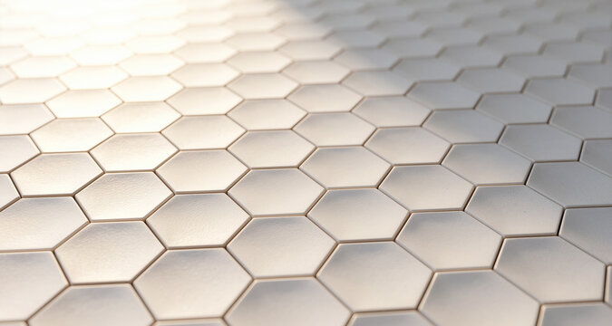 Close up macro capturing smooth white ceramic hexagonal tiles covering flat floor surface forming repeating geometric grid pattern under bright sunlight