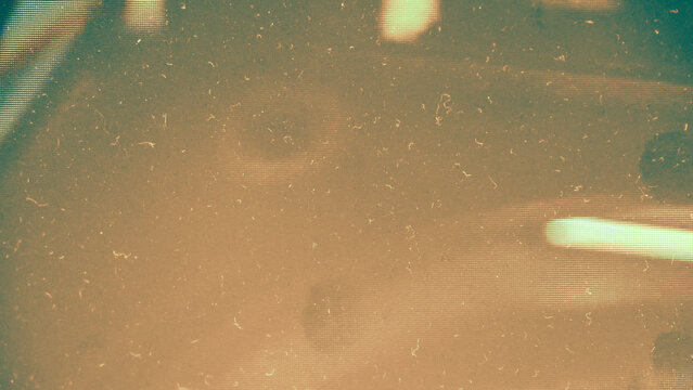 film noise texture and background, old film frame from analog retro film roll, photo texture with grain and scratches for vintage effect with damaged film burn look