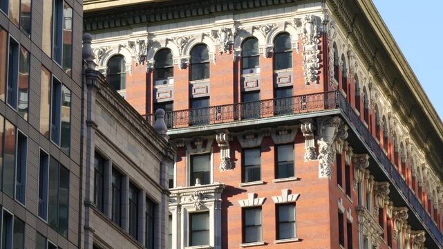 New York City Midtown urban buildings architecture, Manhattan street or avenue, United States of America. Red brick classic house, USA. Typical old historic real estate property in NYC.