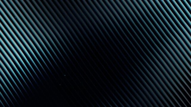 Metallic carbon fiber texture background, dark blue industrial steel diagonal lines, futuristic tech surface with sleek chrome ridges, modern architectural pattern for corporate video