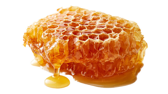 Golden honeycomb block with dripping fresh liquid honey