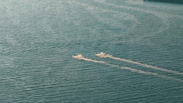 Aerial view of jet ski adventure at JBR beach in Dubai Marina, UAE.