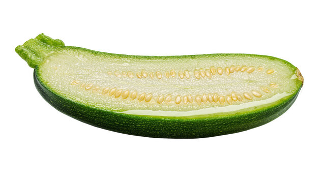 Half cut green zucchini with visible seeds, isolated on transparent background