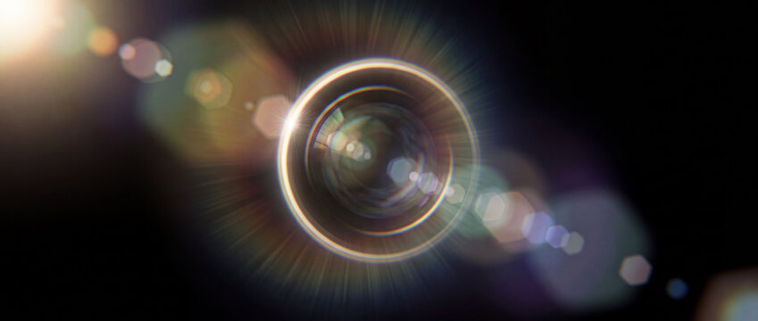 Lens flare overlay with glowing halo and chromatic aberration, featuring vibrant rainbow circles, soft bokeh glare, and background for realistic photo editing, for design use