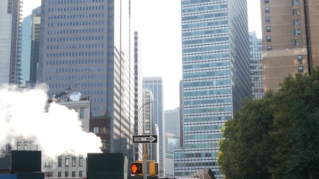 New York City Downtown urban tall buildings architecture, Lower Manhattan Pearl street, United States of America. Financial District skyscraper towers USA. Hot steam smoke in FiDi NYC. Business center