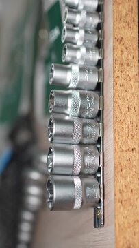 Tool Drawer Organization and Precision Mechanics, This video showcases an organized tool drawer filled with neatly arranged metallic sockets, highlighting precision