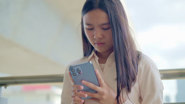 anxious worried teen girl with her smartphone as a conceptual footage for cyberbullying social media trauma, teenager mental health crisis, depression and panic attack