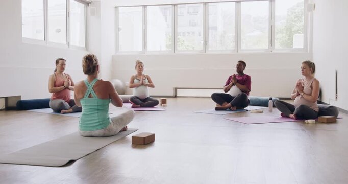Meditation, yoga and pregnancy with women in class for pelvic floor health, flexibility and workout. Pilates, prenatal exercise and healing with group of people in studio for zen and wellness balance