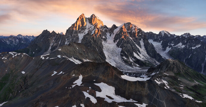 Georgia - Sunrise in Ushba peak. Morning view of Caucasus mountains landscape
