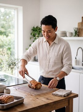 Young East Asian professional man resting roast on trivet