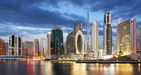 Night view of Dubai with creek canal, UAE