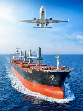 Aerial view of a large universal bulk carrier ship and and airplane above as a concept for transport and logistics