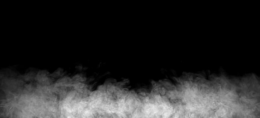 Abstract gray smoke drifting across a black background, creating atmospheric texture with wisps, contrast, extra generous copy space for cinematic, creative, modern designs, overlays, and backgrounds. © wanchai peatoo