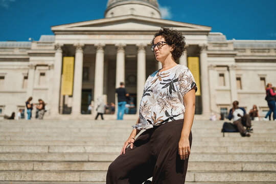 Woman visiting the National Gallery in Trafalgar Square, London
