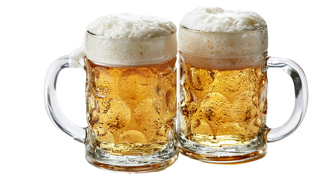 Two dimpled glass beer mugs filled with golden lager and thick white foam heads