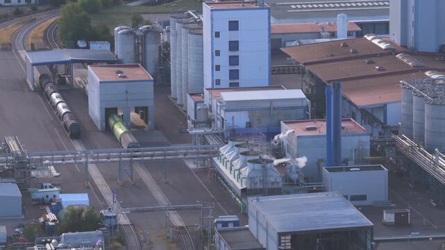 Large Industrial Gas Storage Facility with LPG Tanks and Railway Infrastructure
