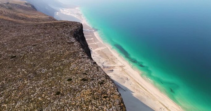Arher Beach And Sand Dunes Viewed From The Top Of The Cliff In Socotra Island, Yemen. - aerial shot