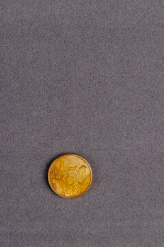 old damaged European Union metal coins with a face value of 50 cents, close up