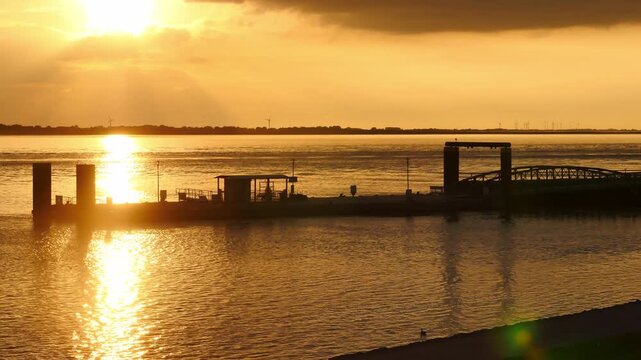 15.09.2026, Bremerhaven - Lower Saxony - Germany. Sunset over the river Weser .