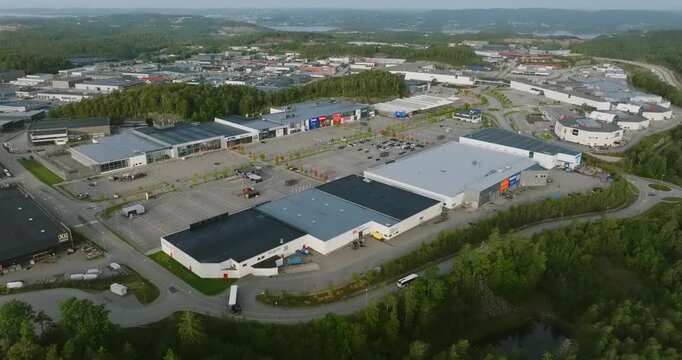 Aerial view of S&oslash;rlandsparken commercial district in Kristiansand Norway in slow motion showing public space