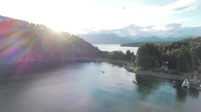 4K drone aerial view of Bah&iacute;a San Patricio in Villa La Angostura, Neuqu&eacute;n, Argentina. Crystal-clear waters of Lake Nahuel Huapi meet lush Patagonian forests and spectacular mountain scenery.