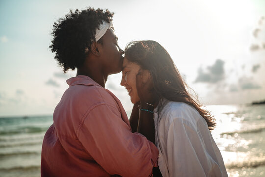Couple enjoying their tropical vacation with peace of mind, secured by reliable travel insurance