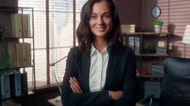 Confident Caucasian business woman with folded arms looking at camera in office female businesswoman manager leader boss entrepreneur employer worker company professional lady posing portrait indoor