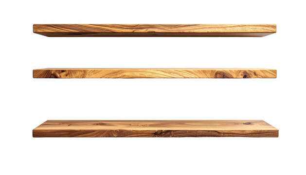 Three simple wooden shelves isolated against a black background