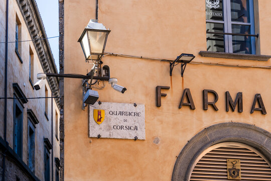 Detail of a carved stone sign identifying the Corsica district in the historic centre, a medieval area of Orvieto characterized by narrow streets and historic buildings, Orvieto, Umbria, Italy