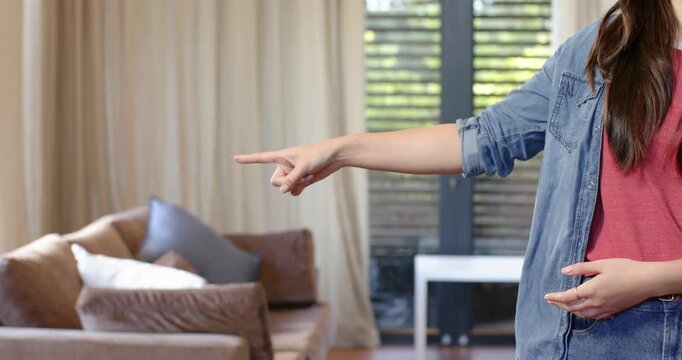 Close up of people talking to the camera, gesturing with hand, woman in casual clothes standing in l