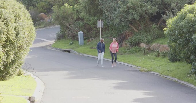 Lifestyle videos outdoor of people doing activities, enjoying morning exercise, couple walking outdo