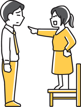 大人の男性に指を指して注意する女の子