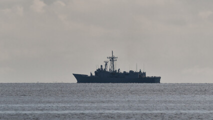 GUIDED MISSILE FRIGATE - A warship is sailing on the sea © Wojciech Wrzesień