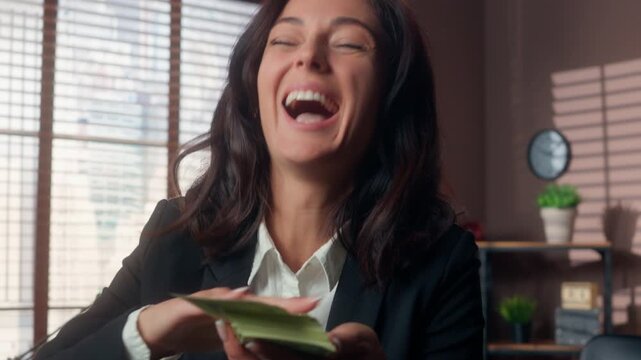 Happy Caucasian business woman throwing money indoor office smiling with cash businesswoman celebrating financial success female manager excited by salary bonus profit indoors workplace employee joy