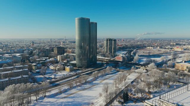 Snowy Riga links modern towers and transport in a vision of resilient city life
