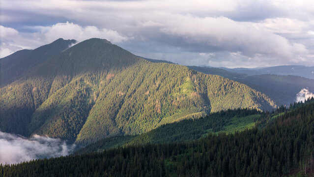 Sunrise Fog over Rarau Mountains in Romania, Aerial View