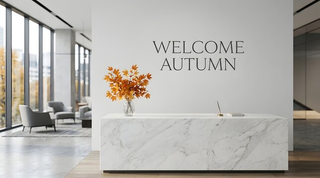 Modern office reception area with welcome autumn sign on the wall.