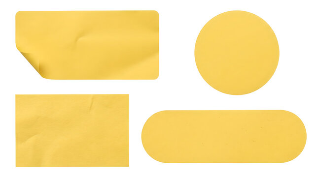 Set of four blank yellow adhesive paper stickers isolated on transparent background