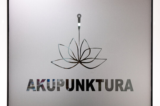 Akupunktura Sign with Lotus Flower
