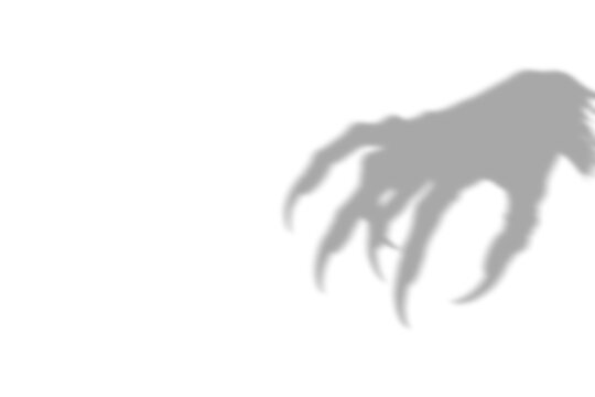 A dark scary shadow of a sharp clawed monster hand cast on a wall creating a spooky atmosphere for halloween isolated on transparent background