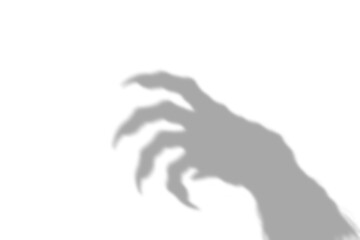 A dark scary shadow of a monster hand with sharp claws reaching out from the side presented as an isolated isolated on transparent background © AHAMMED
