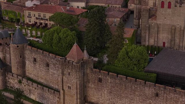 Medieval fortification walls of Carcassonne city in France aerial drone hilltop town
